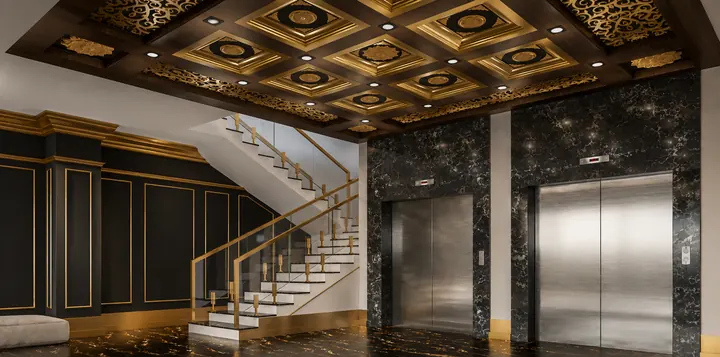 Two lifts beside a glass-railed staircase beneath an ornate timber and gold ceiling
